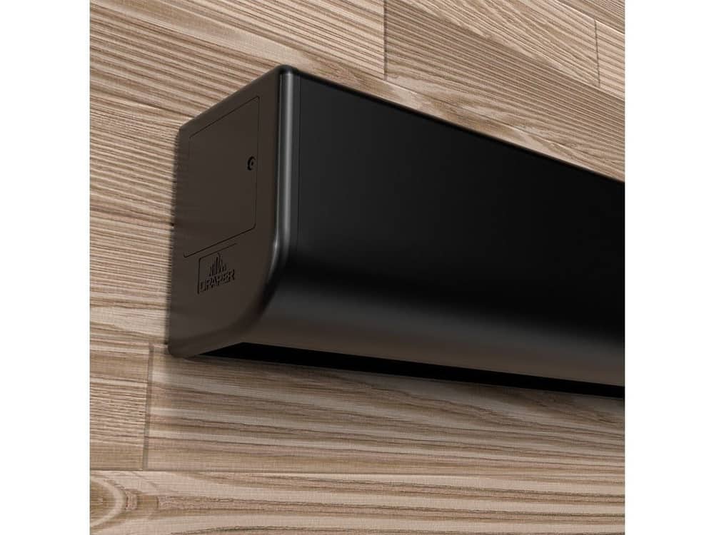 Draper Acumen Recharge V projection screen housing mounted on a wall
