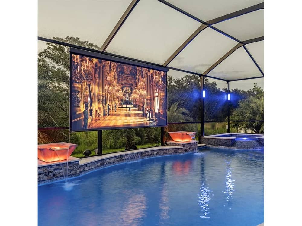 Draper Nocturne+ E projection screen installed at an outdoor pool